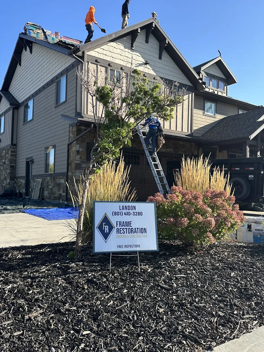 Frame Restoration Utah crew working on residential roof replacement in Utah
